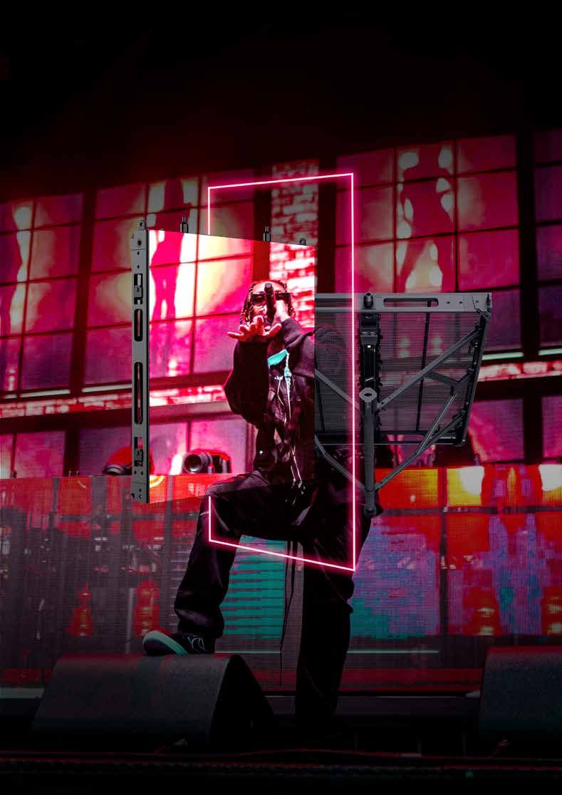 Performer on stage seen through a transparent Nomad Flex mesh screen