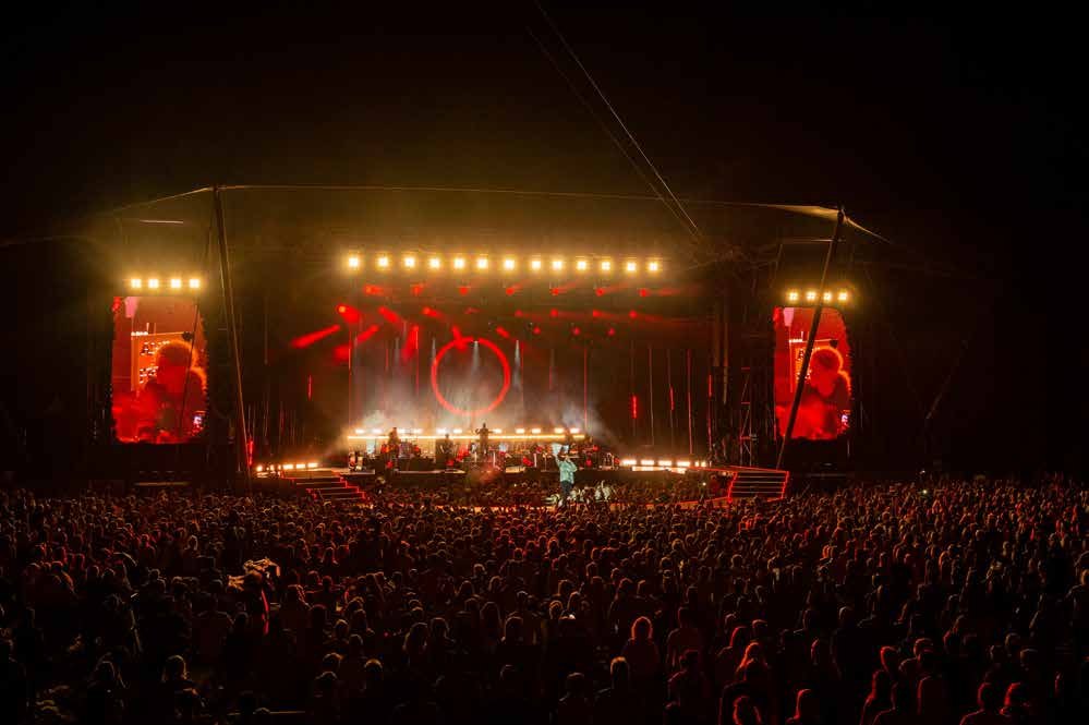 Nomad Flex touring LED screens flanking a stage at a live concert